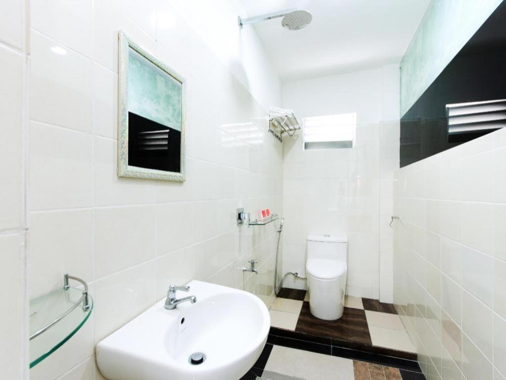 Oyo 44011 Weng Bee Guest House Kota Kinabalu Bagian luar foto