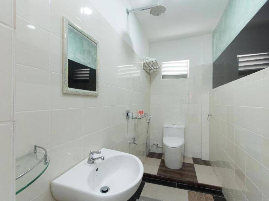 Oyo 44011 Weng Bee Guest House Kota Kinabalu Bagian luar foto