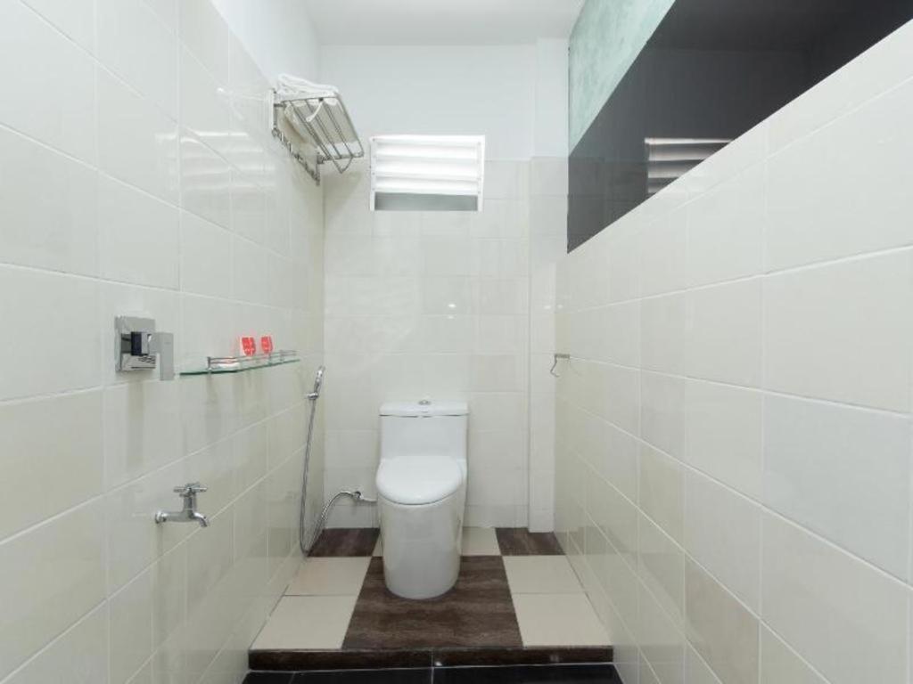 Oyo 44011 Weng Bee Guest House Kota Kinabalu Bagian luar foto