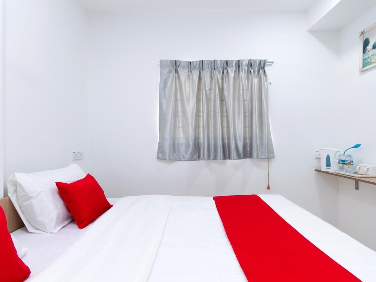 Oyo 44011 Weng Bee Guest House Kota Kinabalu Bagian luar foto